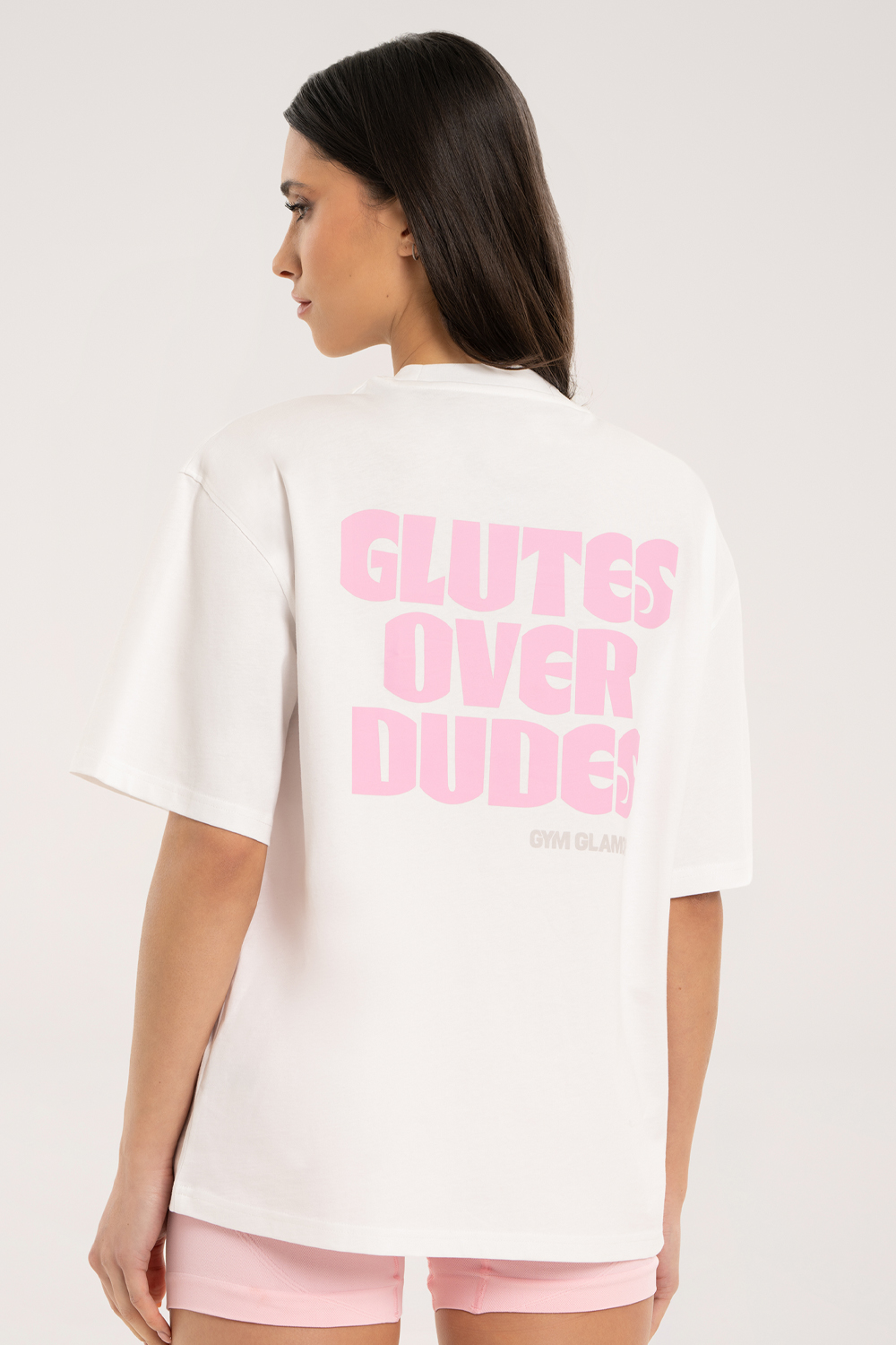 Oversize marškinėliai "Glutes Over Dudes"